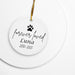 Ceramic ornament with paw print and text 'forever loved Luna 2010-2025' on a white background