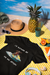 Black unisex organic cotton t-shirt with dachshund on a jetski graphic 